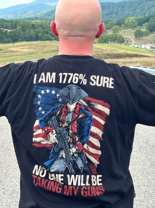 Happy customer showing off his 1776% Sure t-shirt.