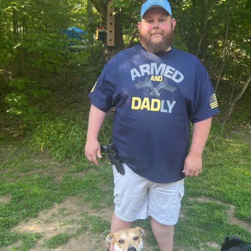 One of our awesome customers enjoying his Armed and Dadly t-shirt.