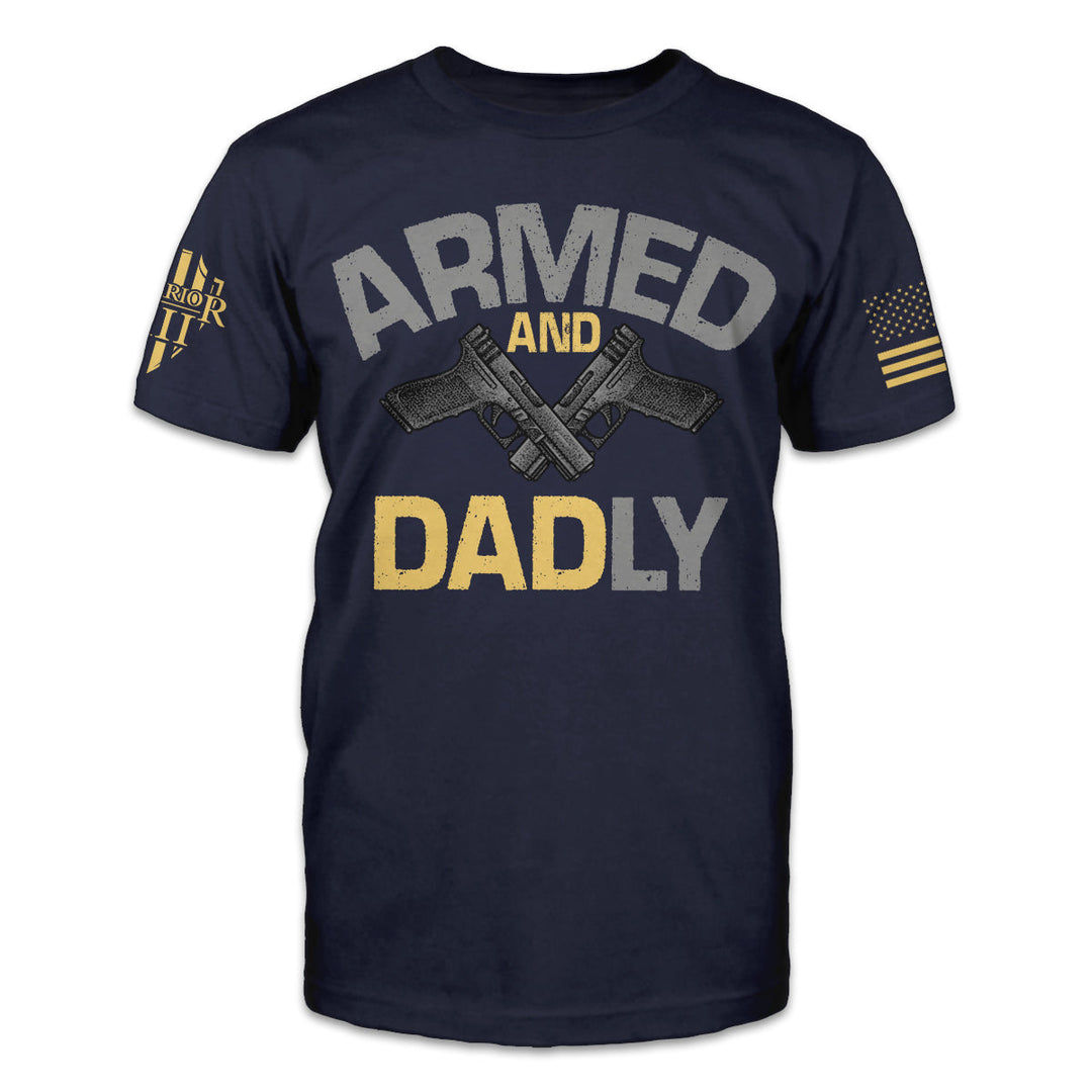 Navy t-shirt with the words "Armed and Dadly" Under the word armed, is a set of black handguns and then 'Dadly' written below the guns with the word DAD being in a yellow with a grey L and Y